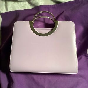 Small ladies lilac colored purse